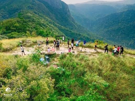 Group of hikers resting at a Mount Gemi lookout point