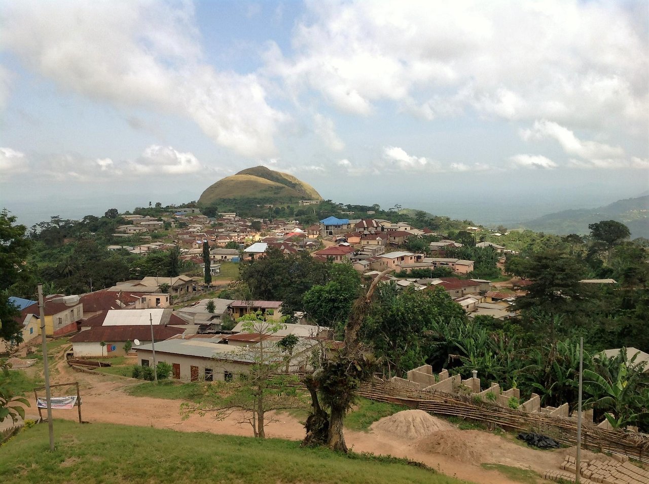 Amedzofe village nestled in the hills with Mount Gemi rising in the distance